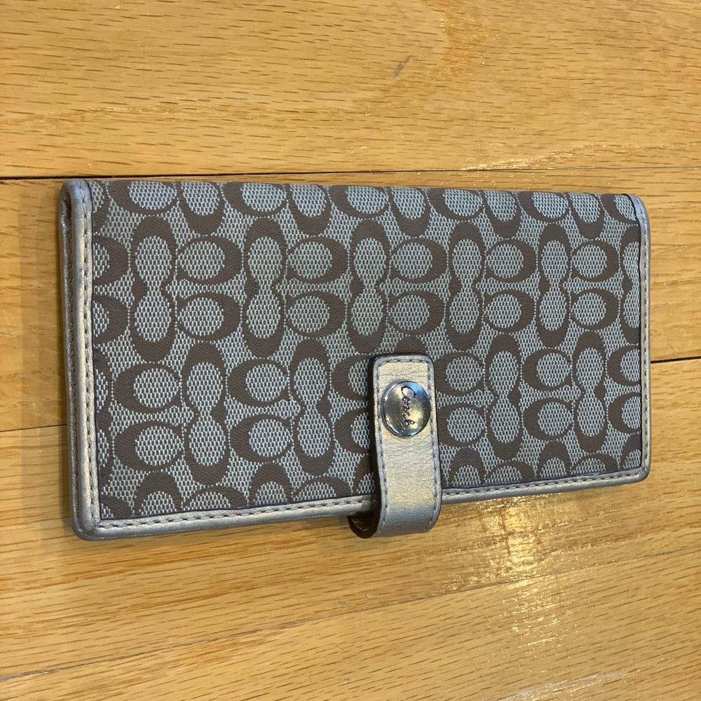 Coach brown and gold wallet.